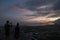 silhouette of couple on Rang hill,Phuket city view point at twilight time with Phuket city in dusk in background