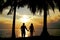 Silhouette couple stand hold hand in front of the sea have coconut tree, look love , so sweet and romantic
