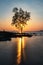 Silhouette couple and tree at sunset at Koh Kwang, Krabi