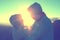 Silhouette of couples happy at scenic mountain fog and sun