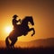 silhouette of a cowboy at sunset on a horse rearing. ai generative