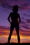 Silhouette cowgirl from back
