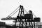 Silhouette of cranes for containers and shipbuilding transportation cantilever crane