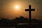 Silhouette of cross and bible with the sunset as background, christian concept, spirituality and religion