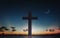 Silhouette of crucifix cross at sunset time and night sky with moon background