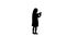 Silhouette Cute little girl uses a smartphone and laugh track matte