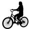 Silhouette of a cyclist female on white background