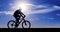 Silhouette of the cyclist riding