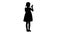 Silhouette Delighted girl in black dress clapping her hands.