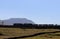 Silhouette of diesel locomotives with mountain