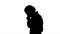 Silhouette Doctor man walking stressed with hand on head, shocke