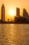 Silhouette of Dubai buildings .