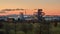 Silhouette of east territory of the exhibition center in Hanover in the January evening. Time lapse.