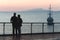 Silhouette elderly couple watching the sunset. sea ocean, concept of pension and vacation, travel in old age big ocean liner,