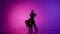 Silhouette Elegant Ballroom Dance Couple on Spotlight neon background