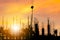 Silhouette of Engineer and worker on building site, construction site at sunset in evening time