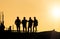 Silhouette of engineers at construction site