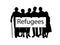 Silhouette family holds placard Refugees.