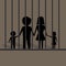 Silhouette of family in jail