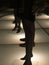 Silhouette of fashion mannequins standing on the illuminated floor