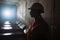 Silhouette of a female digger in the tunnel