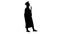 Silhouette Female student in graduation robe holding diploma and