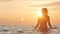 Silhouette figure of a woman coming out from the water in a swimsuit at dawn, a girl swimming in the sea enjoying sunrise, the con