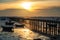 Silhouette fisherman boats and bridge at sunset, Chonburi