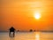 Silhouette of fisherman\'s huts on the sea