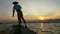 Silhouette fishermen in Inle Lake at sunset, Shan State, Myanmar