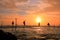 Silhouette of fishermen at sunset, Unawatuna, Sri Lanka