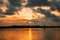 Silhouette of a fishing boat against sunset at Shela Beach in Lamu Island, Kenya