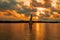 Silhouette of a fishing boat against sunset at Shela Beach in Lamu Island, Kenya