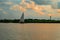 Silhouette of a fishing boat against sunset at Shela Beach in Lamu Island, Kenya