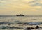 Silhouette fishing boat in sea