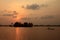 Silhouette of a fishing boat during the sunset