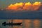 Silhouette of fishing boat at sunset on Taveuni Island, Fiji