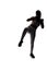 Silhouette of a Fit Female Balancing and Kicking