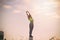 Silhouette fitness woman exercising at sunset time