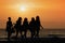 Silhouette five women walking