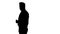 Silhouette Follow me. Young businessman walks in frame and invites you to follow him.