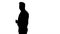 Silhouette Follow me. Young businessman walks in frame and invites you to follow him.