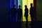 Silhouette of four people, unrecognised person in full length