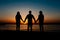 Silhouette of friends on beach