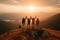 Silhouette of friends cheering on top of mountain