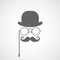 Silhouette of gentleman\'s face with twisted moustache, bowler and glasses