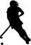 Silhouette of girl hockey player dribbling ball