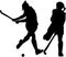 Silhouette of girl hockey players hitting