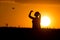 Silhouette of girl looking at drone