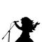 Silhouette girl music sings in microphone